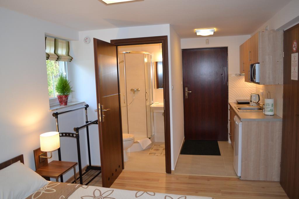 Habitación Triple con zona de cocina